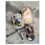4 way tire wrench, hand seeder, roll of wire,