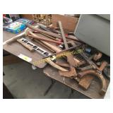Old axes, saws, level, misc