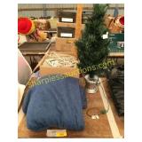 Electric blanket, yard stick, xmas tree, blanket