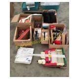 Marble floor tile, cigar boxes, household items