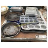 Pizza/cookie sheets, cupcake/bread pans, misc