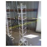 Upright rotating metal display rack