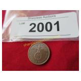 1939 German coin with swastika.