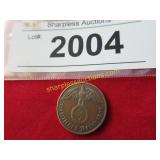 1937 German coin with swastika.