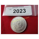 Uncirculated 1889 Morgan silver dollar.