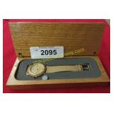 Vintage watch in original wood case.