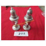 Pair of sterling salt & pepper shakers.