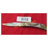 Large pocket knife with eagle.