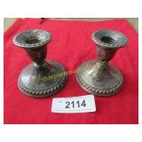 Pair of sterling weighted candlesticks.