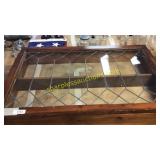 Wooden frame with leaded glass front