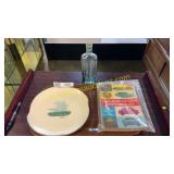 Caravelle player, 1957 car books, glass bottle