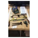 Vent cover, saw, nippers, tiny vice, door knob kit