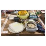 Assorted Tupperware, baking dishes, oven mitts