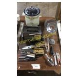 Knives, toaster, crock pot, kitchen utensils,