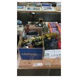 Box of rollerblades, coffee cups