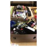 Assorted bottles, vhs movies