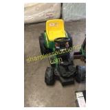 Green ride on tractor