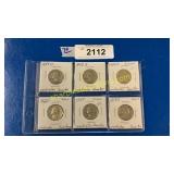 Six silver Washington quarters