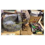 Candle holder, baby seat, guitar magazines