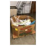 Box of clothes and small bags