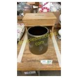 Wooden footstool, crock