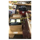 Boxes of picture frames, window blind
