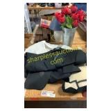 Fake flowers, pillow, chaps suit jacket