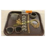 Watch, brackets, sunglasses, hair clip, necklace