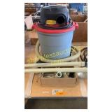 Shop vacuum with extra hose attachments