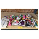 Erasers, calculator binder, pouch, school items
