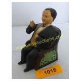 Cast iron mechanical bank.  Book of knowledge