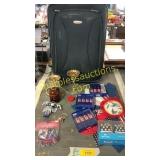 Suitcase, corn picks, candlestick holder