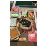 Pot holders, washcloths, picture album, cookbooks