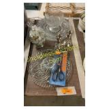 Glass plates, vase, scissors