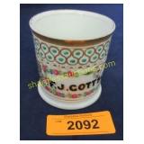 Vintage hand decorated shaving mug.