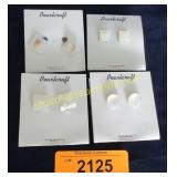 4 Vintage mother of pearl crosses.