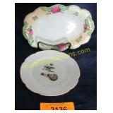 2 hand painted vintage plates.