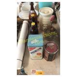 Jar, whisk, cracker tin, syrup bottles, tin