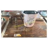 Stool, wooden canes, tin can