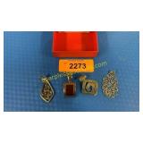 Set of four sterling pendants