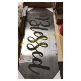 Metal "blessed" sign