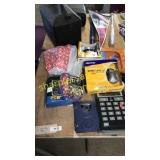 Large calculator, mouse, digital camera, misc