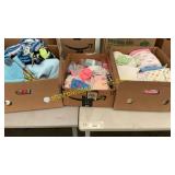 Baby clothes, bottles, blankets