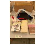 Books & graduation cap/gown