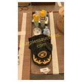 Hats, insect repellent, snow globe