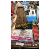 Belt buckle display, candles, comforter