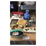 Buttonholer, vase, hat, electric knife