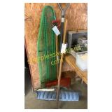 Pile of snow tools, ironing board