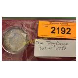 One troy ounce silver .999 round