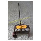 Old cast iron branding iron